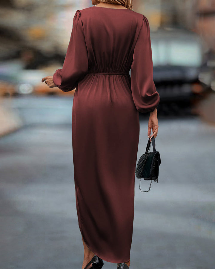Lune London | Elegant dress with lantern sleeves and a V neckline.