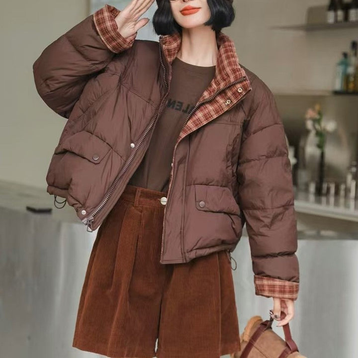 Short women's down jacket with high filling volume