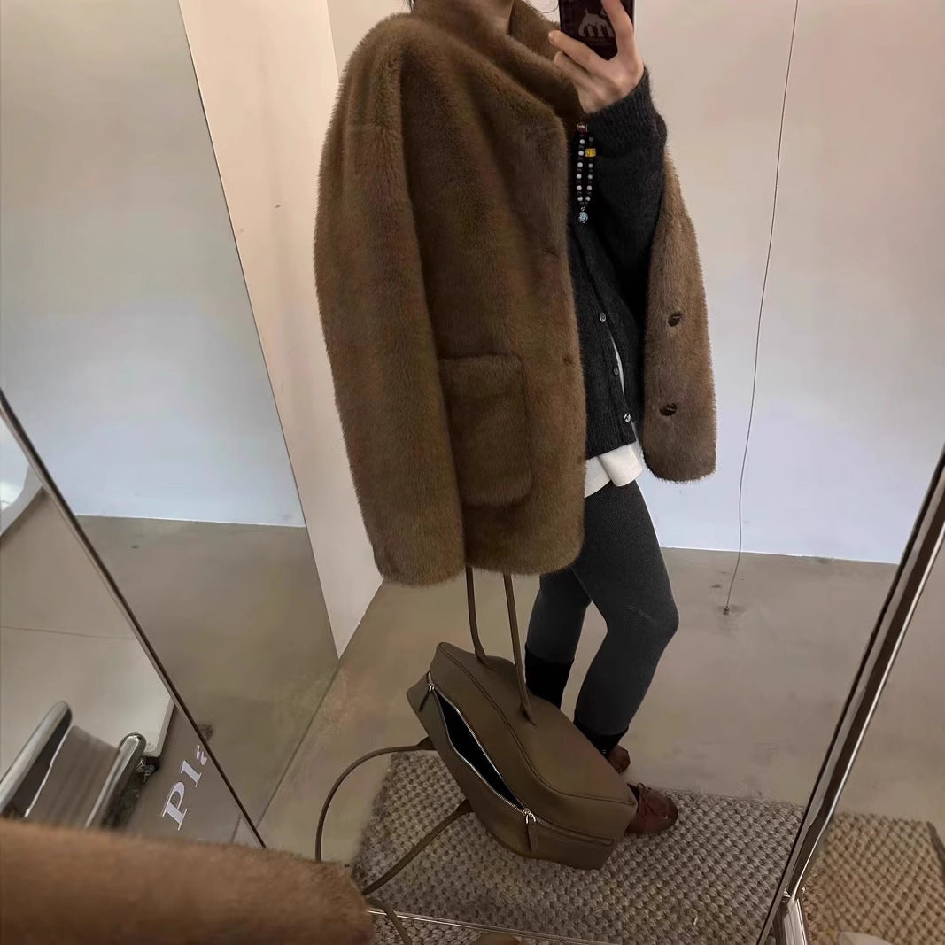 Fashionable faux fur coat, mid-length and lined