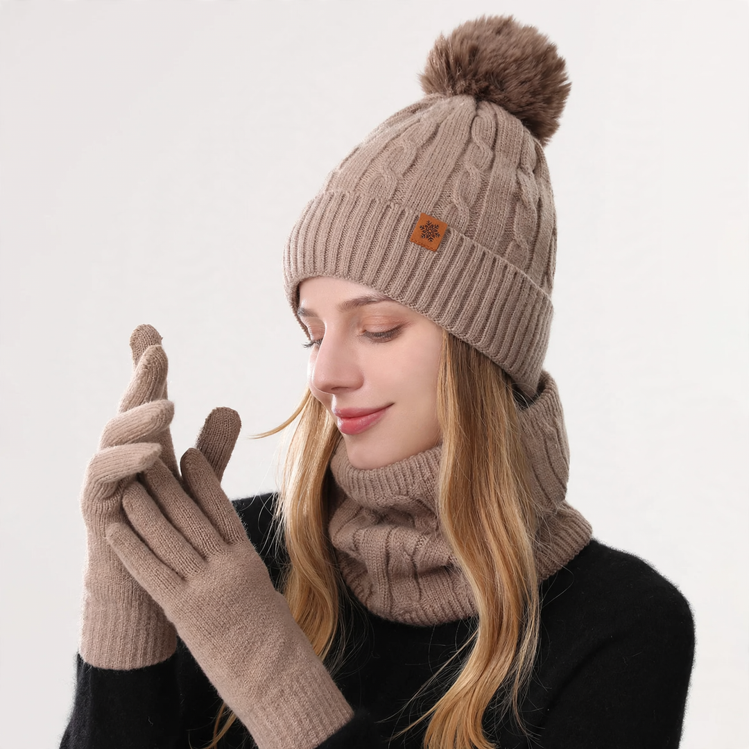 Winter set consisting of knitted hat, scarf, and gloves