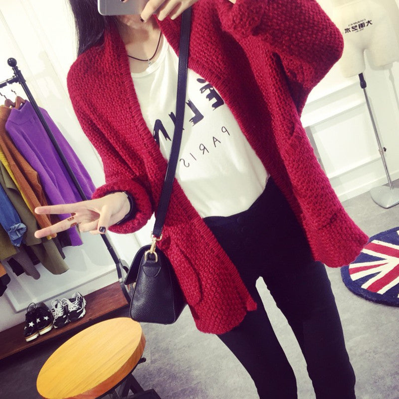 Ladies Large knitted cardigan with a relaxed fit and practical pockets Lune London