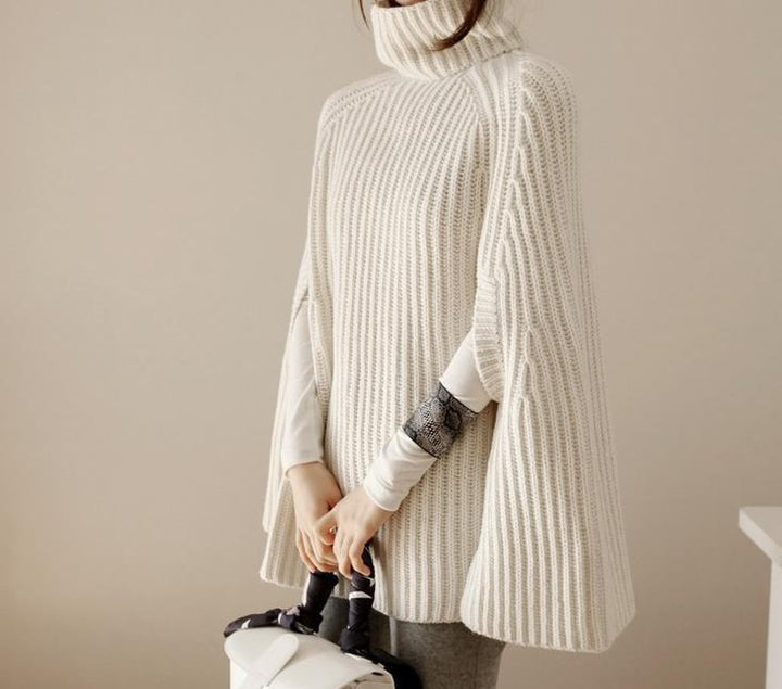 Knitted poncho for women with high collar and trendy ribbed pattern Lune London