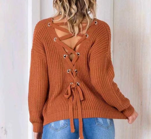 Casual knitted pullover for women with decorative cutout at the back and drawstring Lune London
