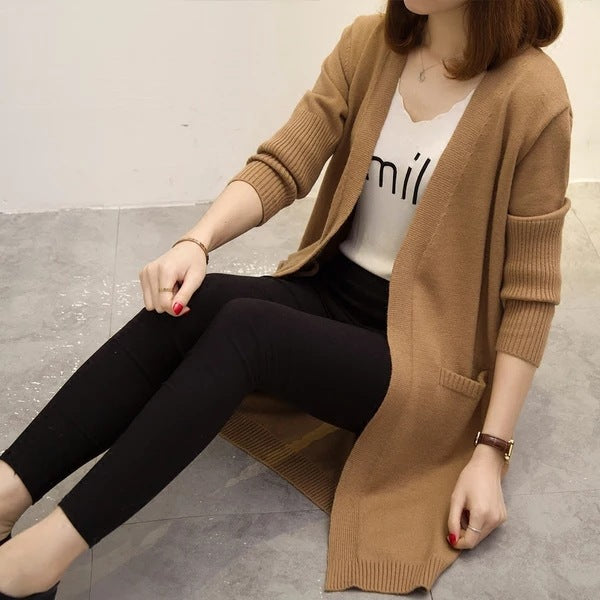Long knitted cardigan for ladies with a relaxed fit and deep V-neck Lune London