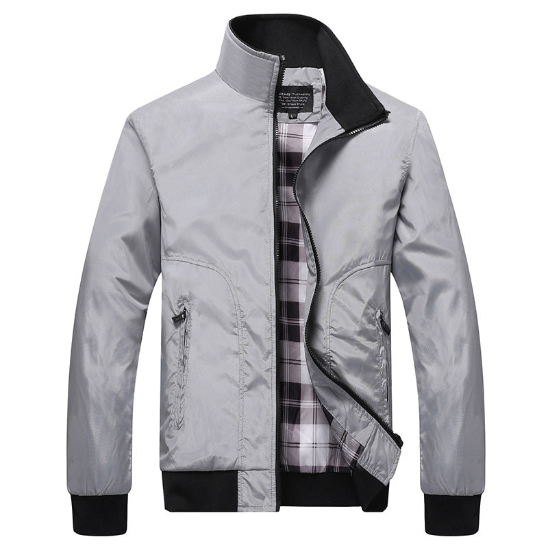 Lightweight transitional jacket for men with a high collar and practical zip pockets Lune London
