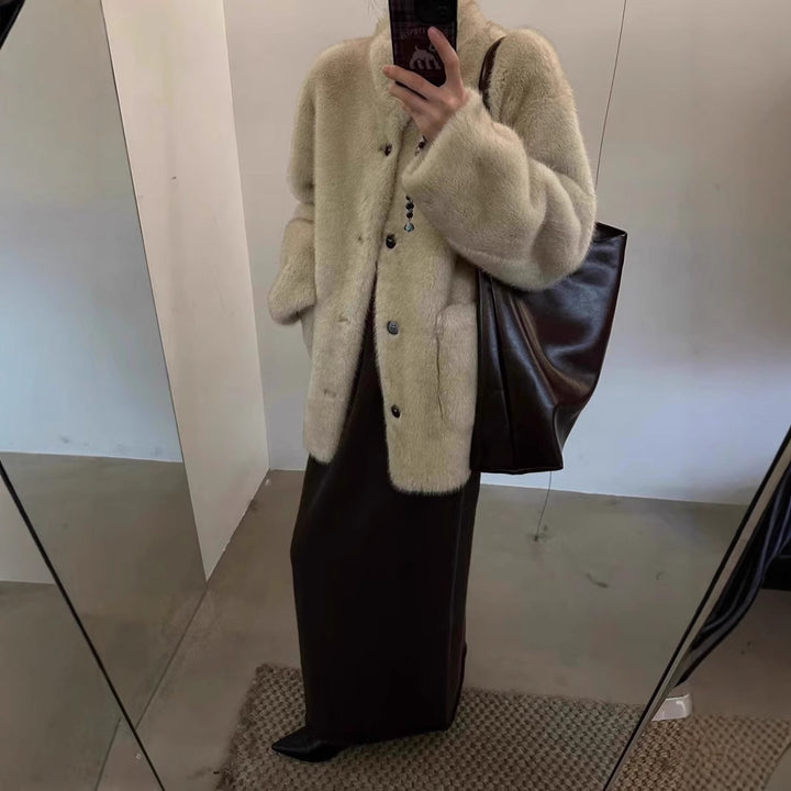 Fashionable faux fur coat, mid-length and lined