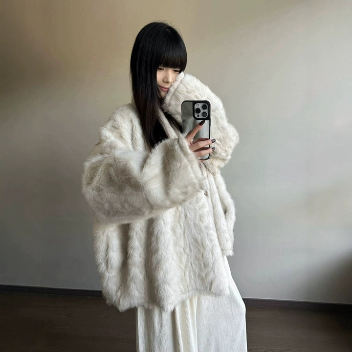 Warmer faux fur coat with bat sleeves
