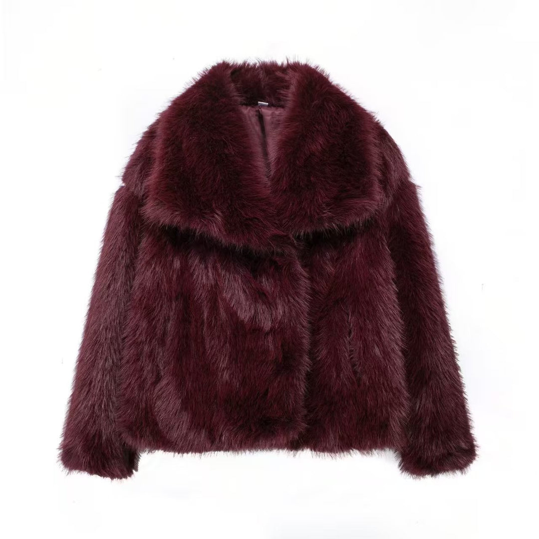 Fashionable coat with large faux fur lapel