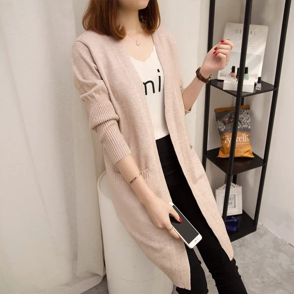 Long knitted cardigan for ladies with a relaxed fit and deep V-neck Lune London