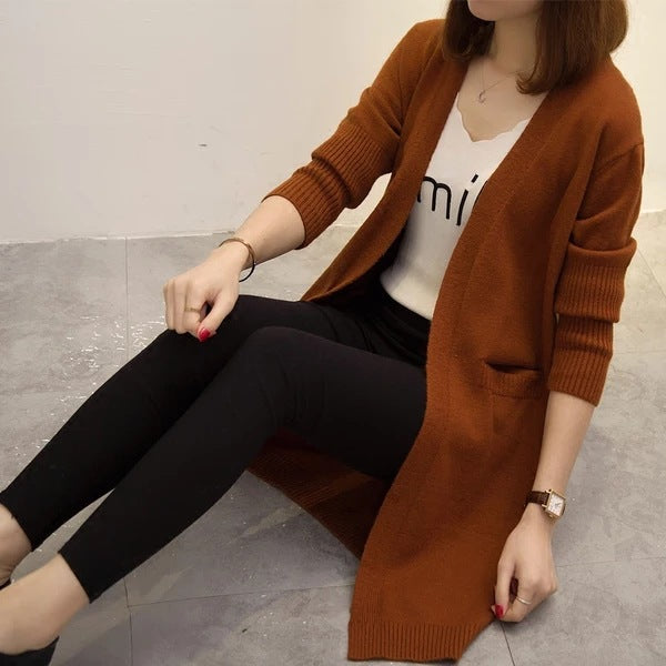 Long knitted cardigan for ladies with a relaxed fit and deep V-neck Lune London