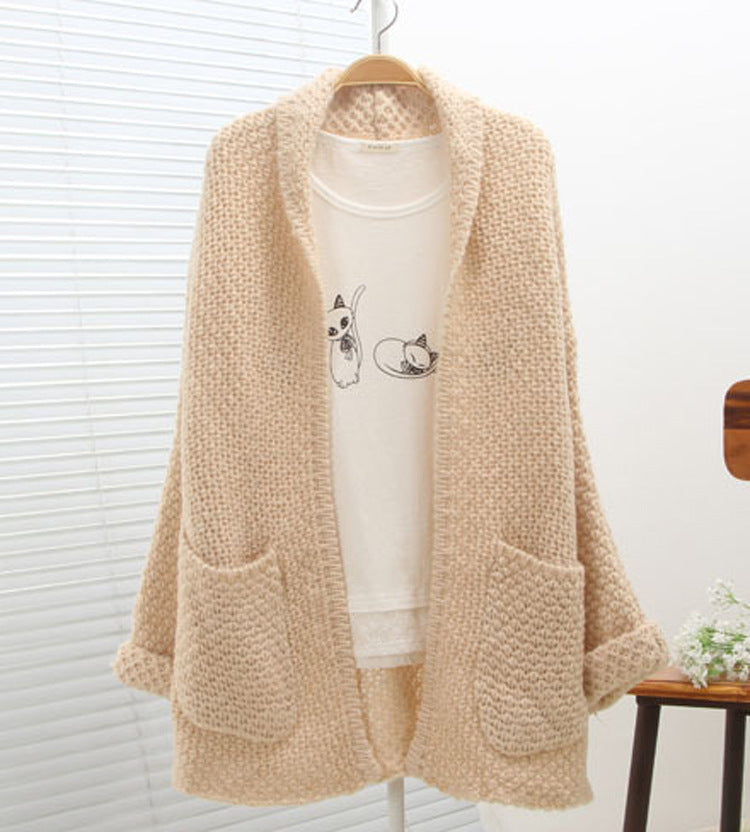 Chunky knit cardigan for women with raw edges and practical pockets Lune London