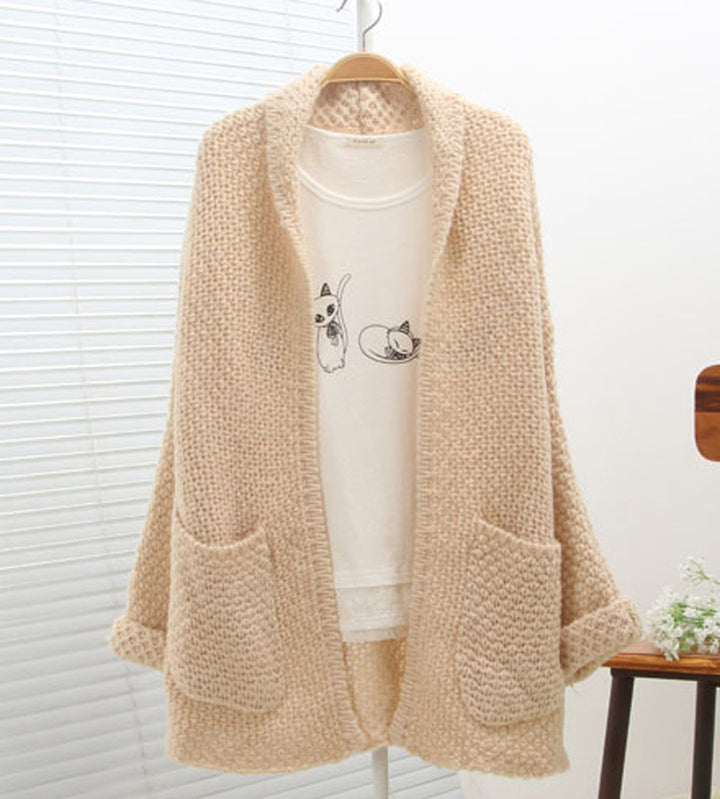 Chunky knit cardigan for women with raw edges and practical pockets Lune London