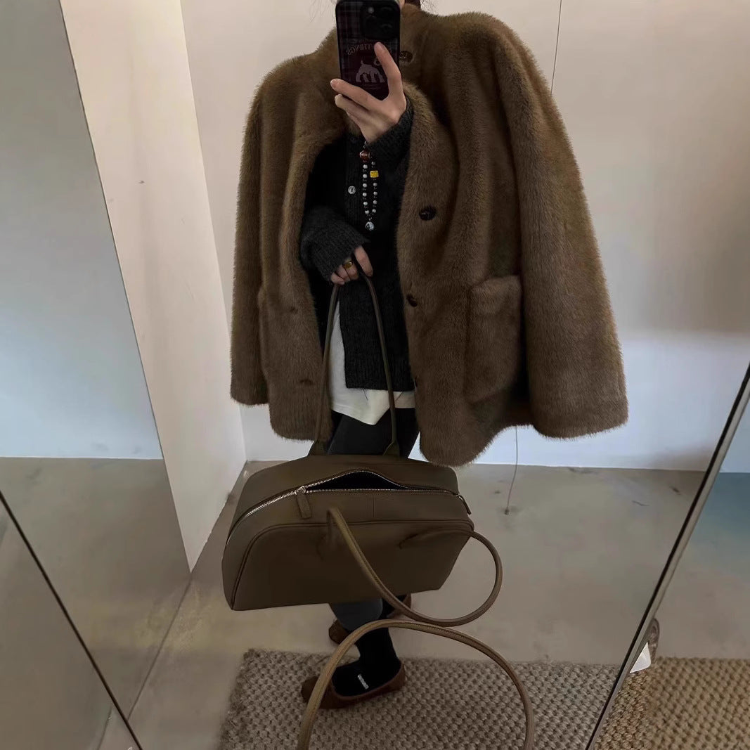 Fashionable faux fur coat, mid-length and lined