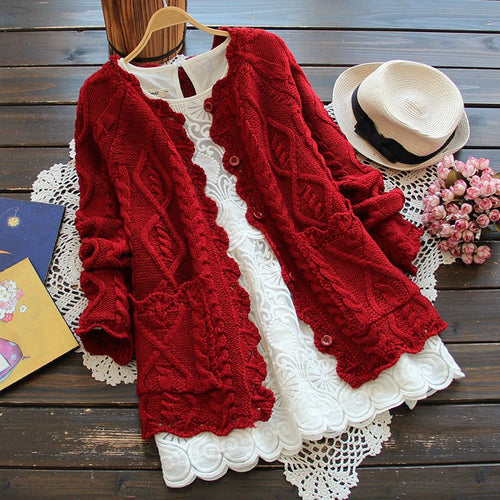 Women’s cardigan with a rich detail cable pattern and frill-shaped finishes Amarae