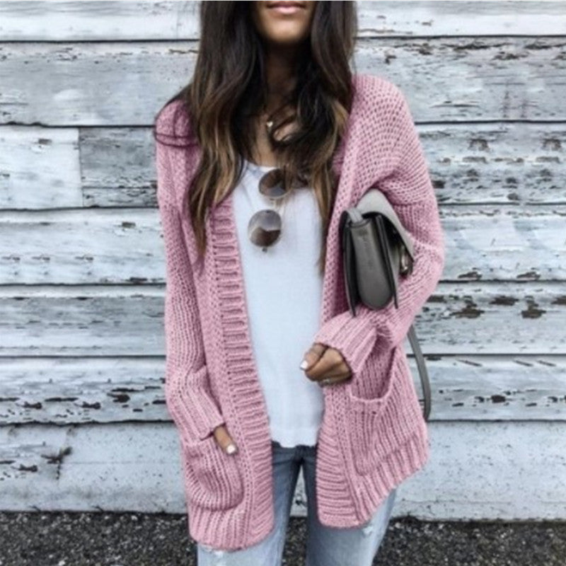 Thick knitted cardigan for women with a relaxed fit and practical pockets Lune London
