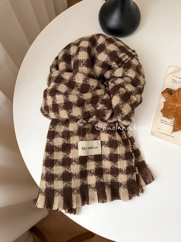 Warm scarf in various shades of brown