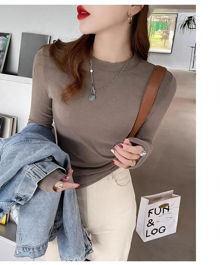 Women's knit shirt with stand-up collar