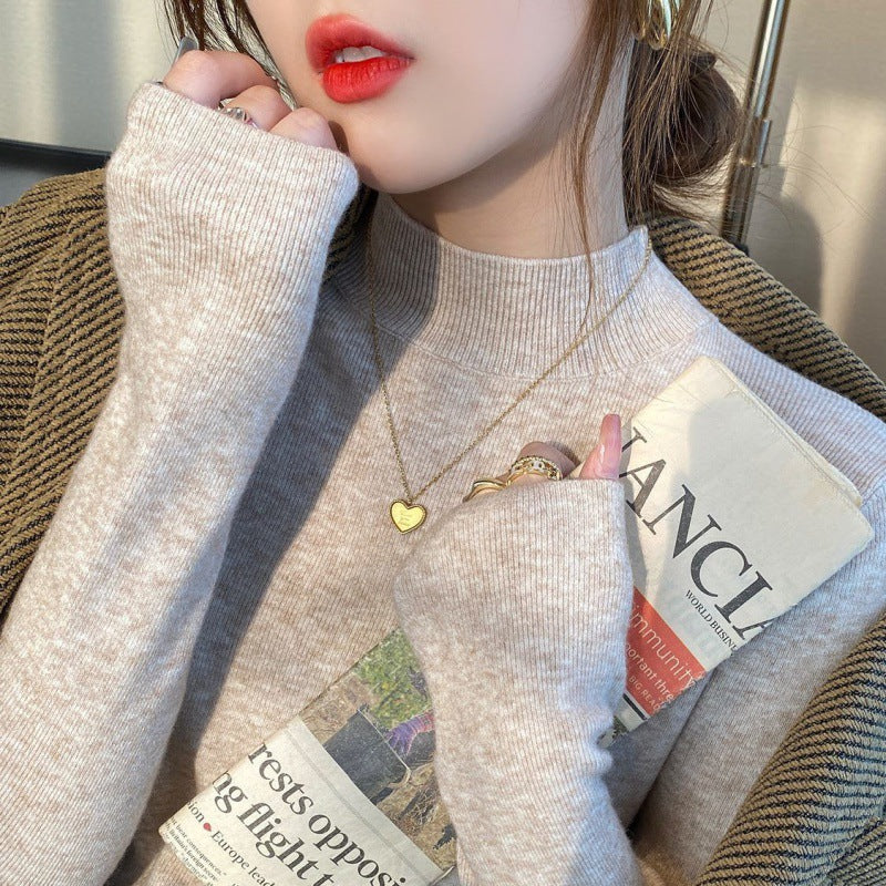 Women’s knitted sweater, stand-up collar, fitted