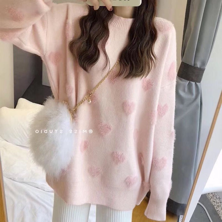 Pull féminin confortable avec motif en forme de cœur Chic & Stil