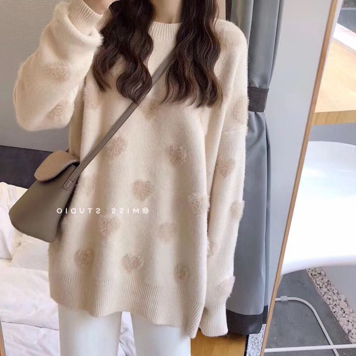 Pull féminin confortable avec motif en forme de cœur Chic & Stil