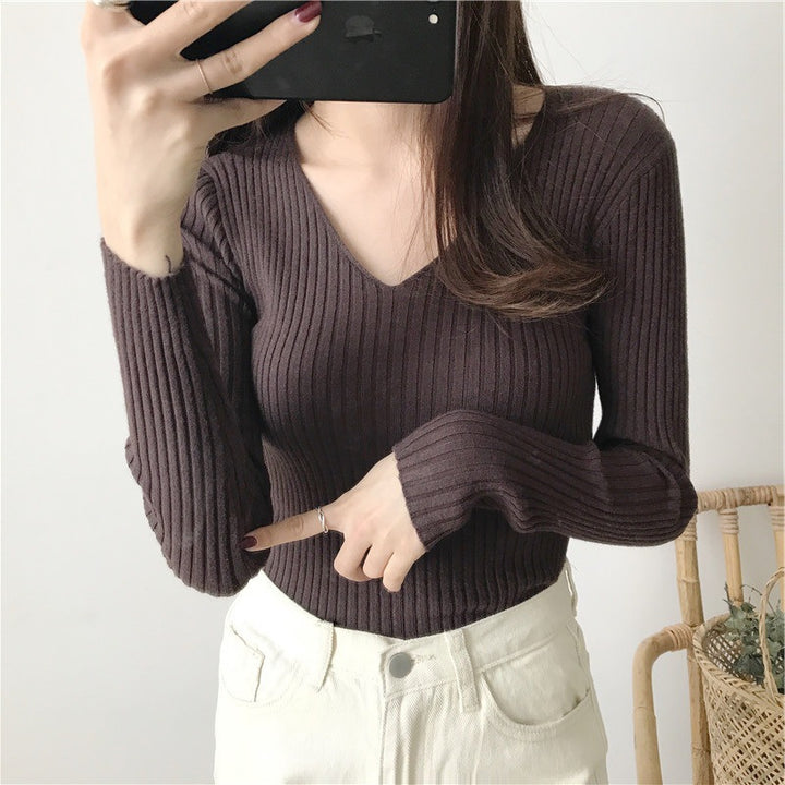 Long sleeve blouse for women with V-neck and textured ribbed design Lune London