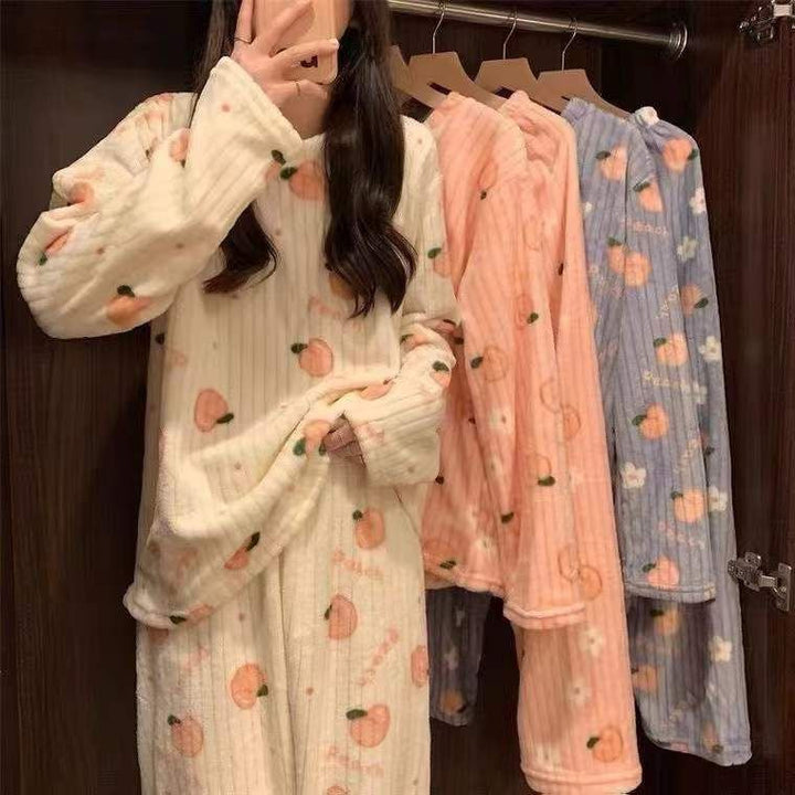Fluffy coral fleece pajamas with bear motif