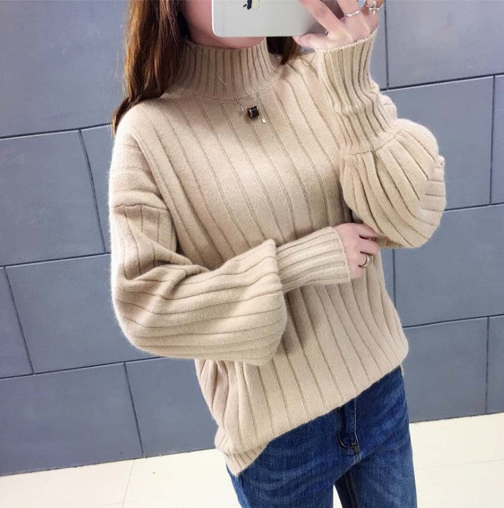 Knitted sweater for women with high collar and voluminous sleeves Lune London