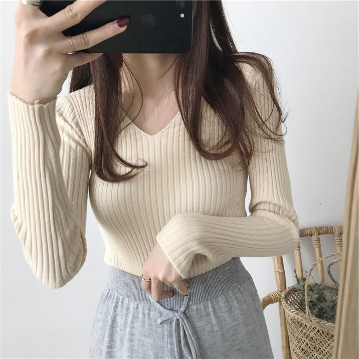 Long sleeve blouse for women with V-neck and textured ribbed design Lune London