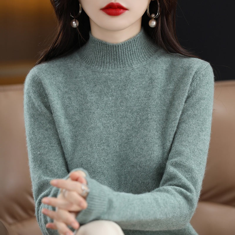 Women's wool pullover with stand-up collar and ribbed texture