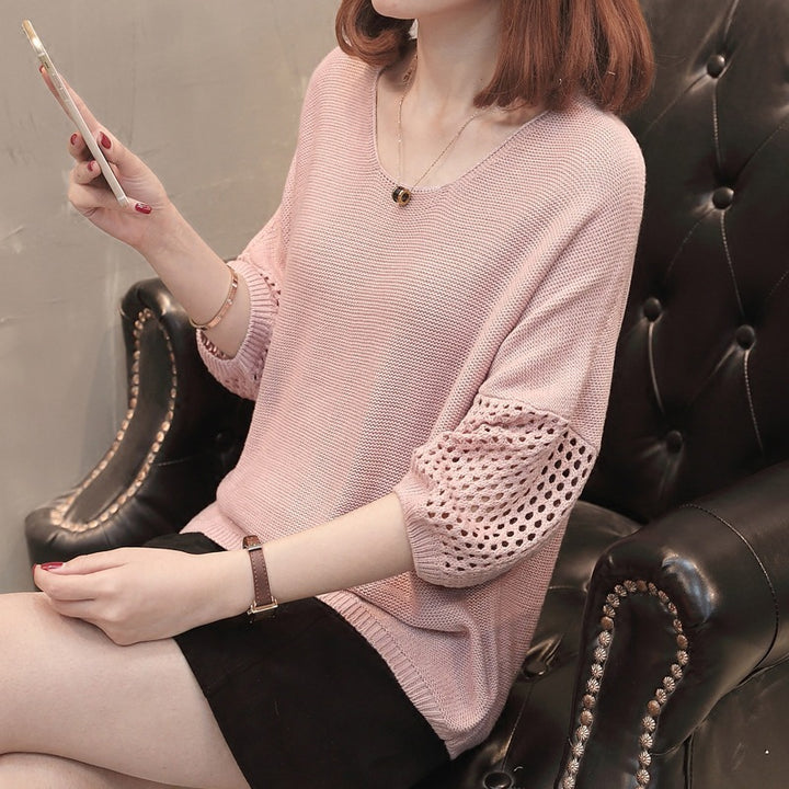 Pull en tricot pour femmes avec des manches aérées et un motif de crochet moderne Chic & Stil