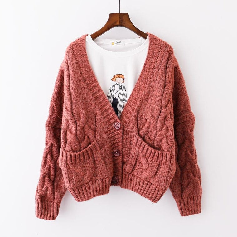 Women's chunky knit cardigan with decorative pockets and button embellishments Lune London