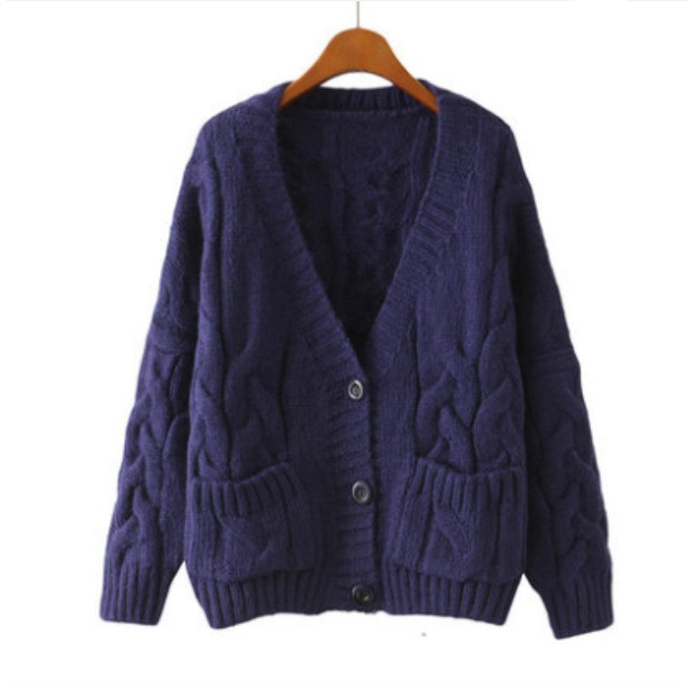 Women's knitted jacket with cable pattern and generous pockets Lune London