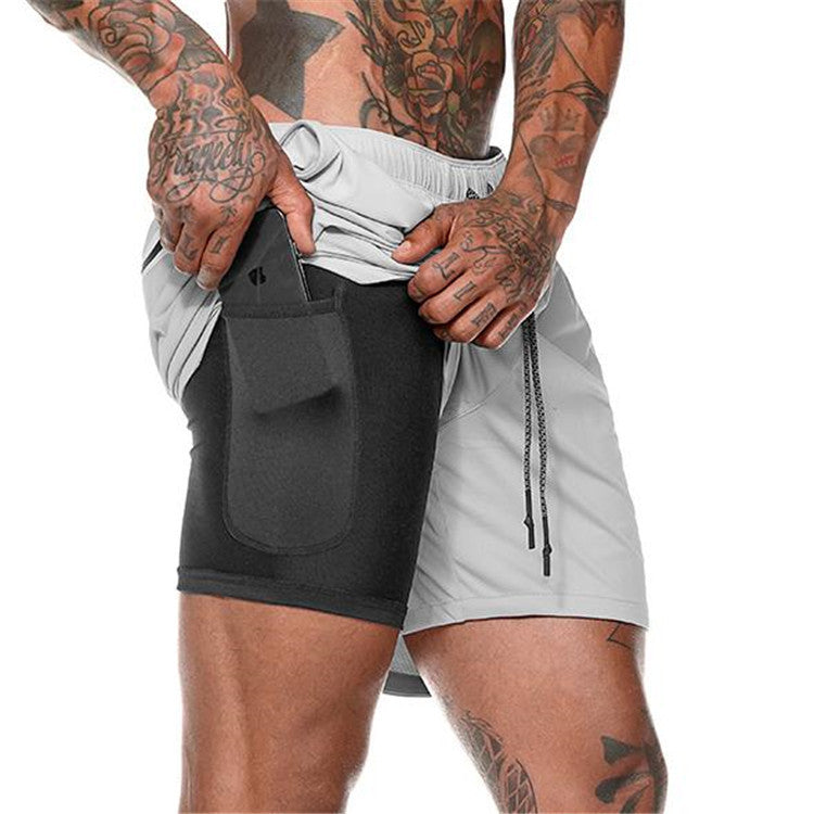 Multifunctional sports shorts for men with integrated shorts and practical pockets Lune London