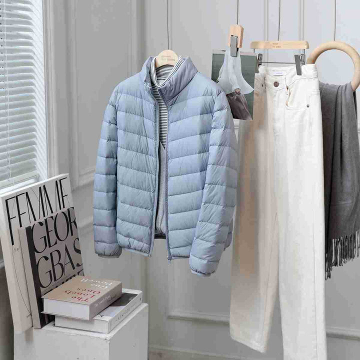 Light women's down jacket with stand-up collar, white duck down