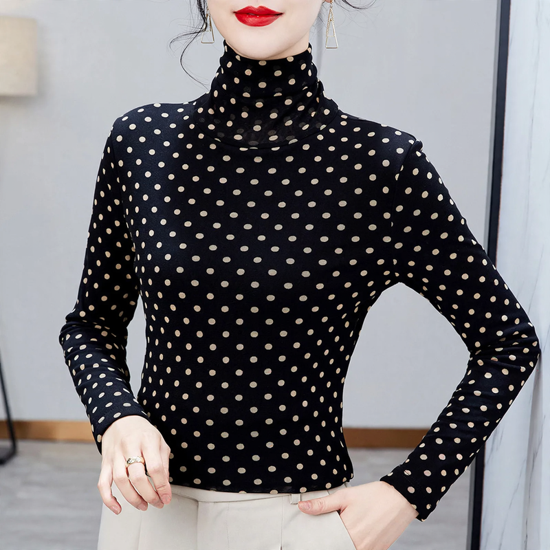 Women's top with stand collar and polka dot pattern
