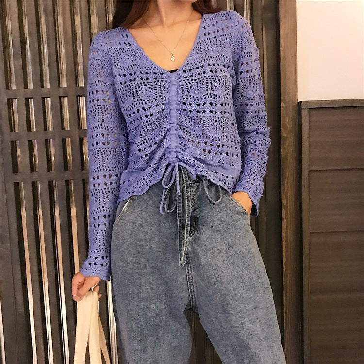 Knit sweater for women with a decorative hole pattern and an adjustable drawstring Lune London