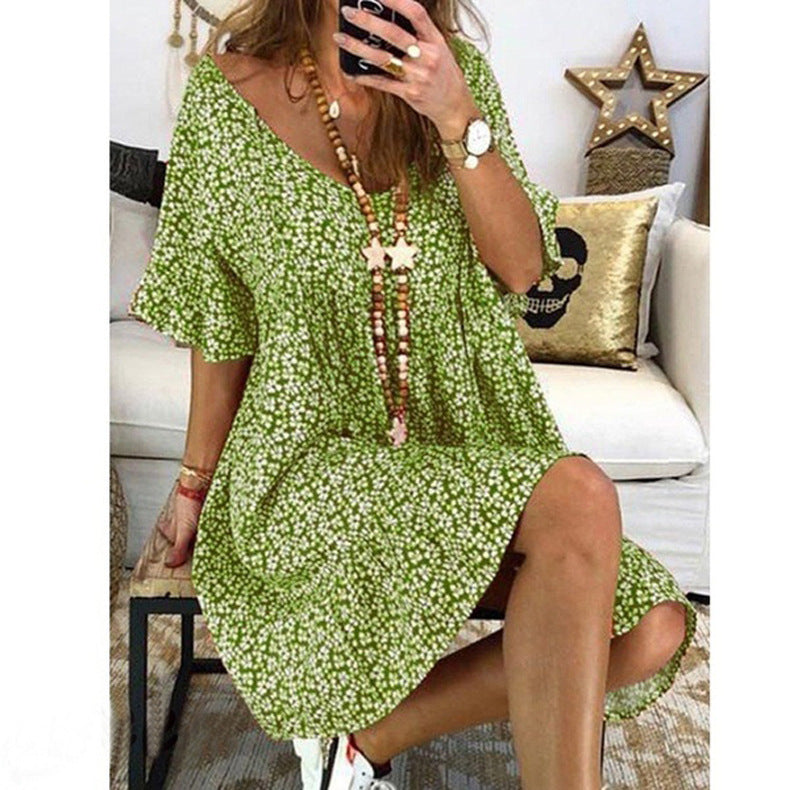 Casual dress for women with voluminous sleeves and a deep V-neck Lune London