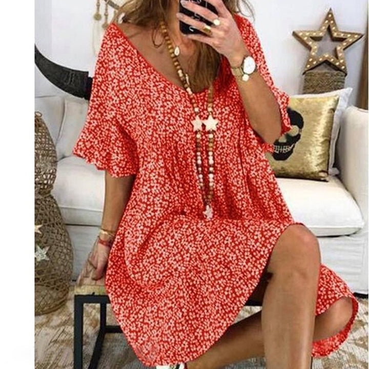Casual dress for women with voluminous sleeves and a deep V-neck Lune London