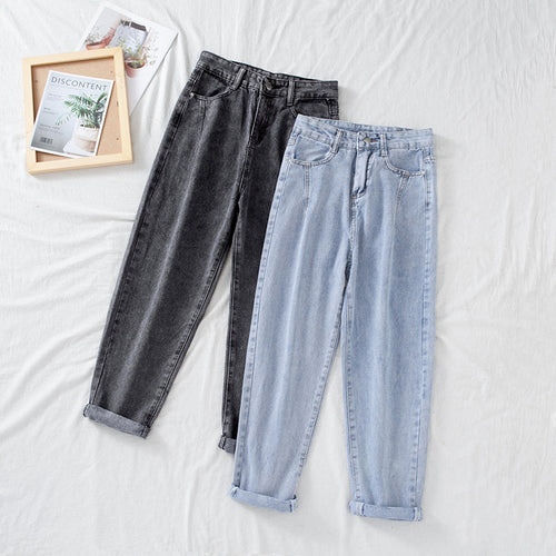 Women's high-waisted jeans in classic mom style with turned-up hems