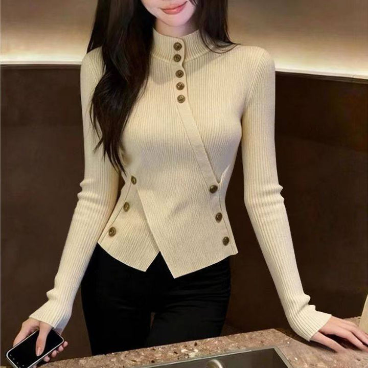 Women's knitted sweater with stand-up collar and asymmetrical cut