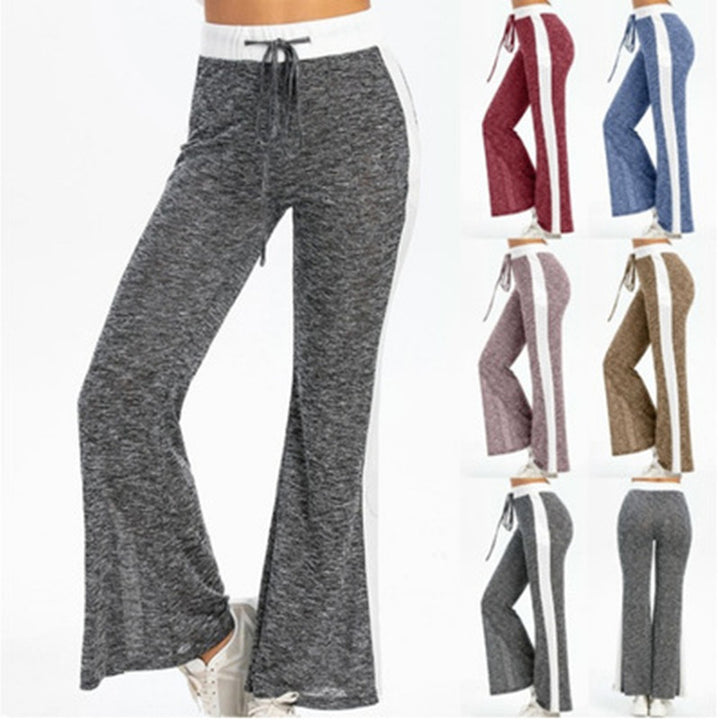 Fluid sports pants for women with side stripes and elastic waist Lune London