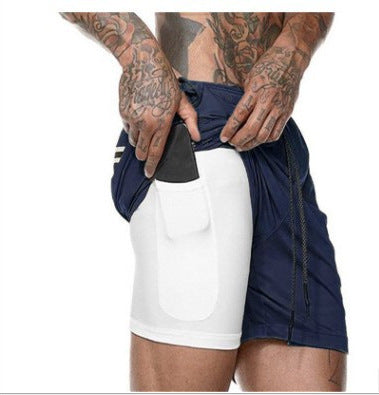 Multifunctional sports shorts for men with integrated shorts and practical pockets Lune London
