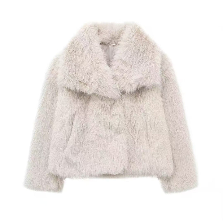 Fashionable coat with large faux fur lapel