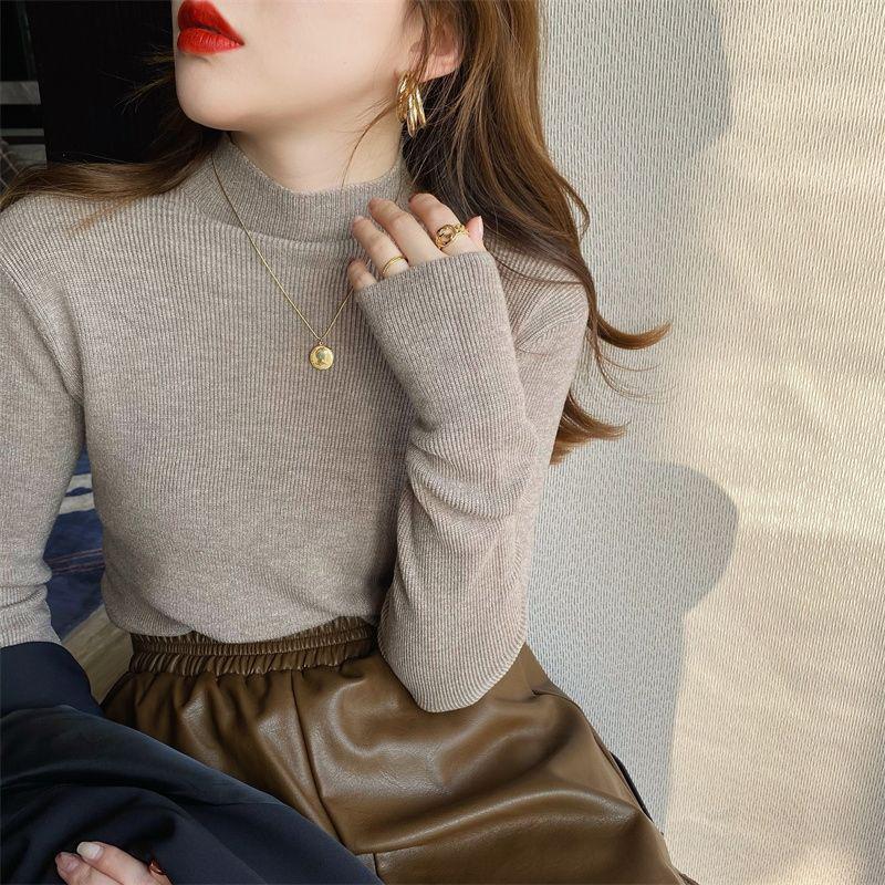 Women's knitted pullover with stand-up collar, fitted