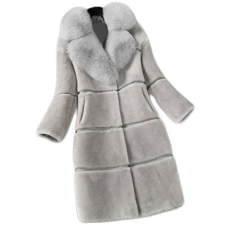 Women's coat made of sheared lambskin with faux fur collar