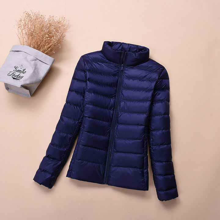 Light women's down jacket, short, with white duck down