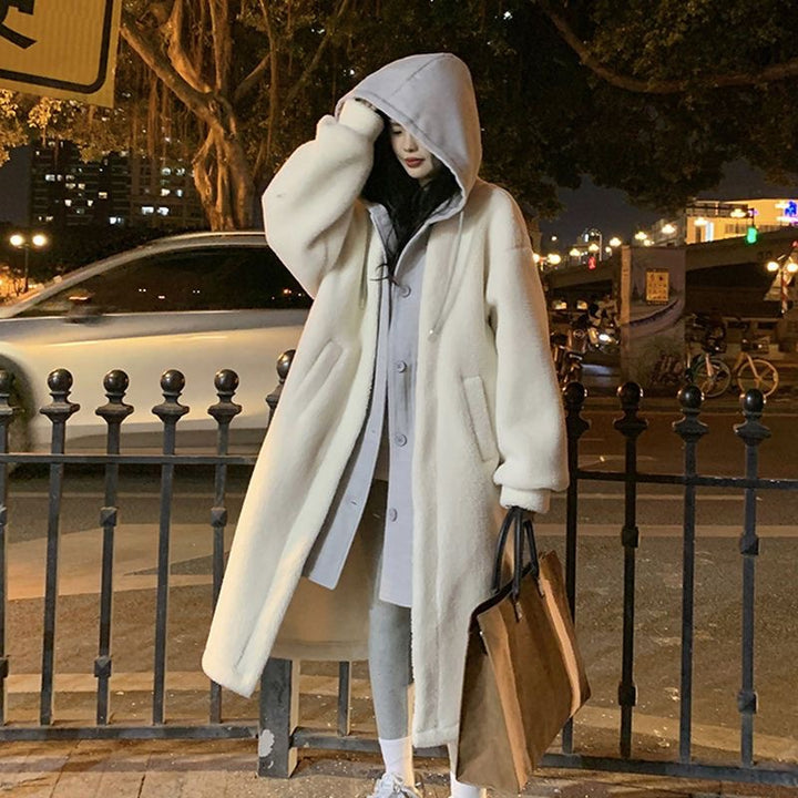 Long women's hooded jacket made of lamb fleece imitation