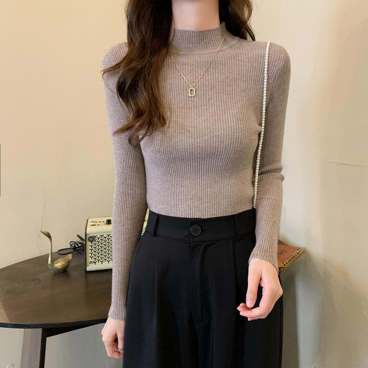 Versatile women's knitted pullover with stand-up collar