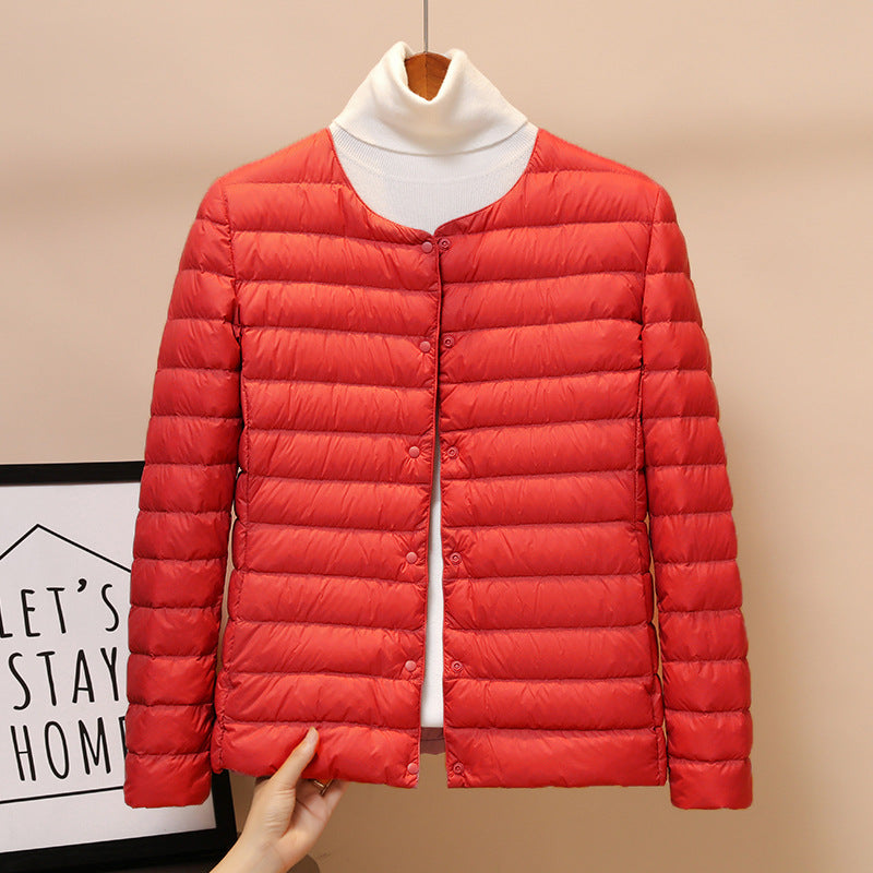 Light women's down jacket, short, as a base layer jacket