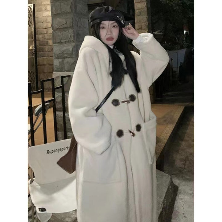 Mid-length women's winter coat with toggle buttons